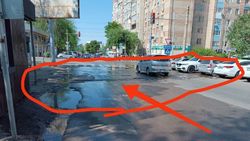 Асфальт по Шопокова не восстановили после ремонтных работ. Фото