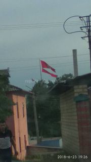 В городе Ош из-за ветра порвался флаг <i>(фото)</i>
