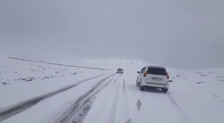 Видео — На перевале Отмок выпал снег