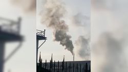 Из трубы здания компании «Рола» каждый день валит черный и густой дым