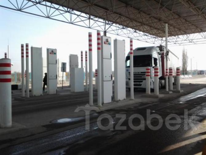 Фоторепортаж —Процесс перемещения товаров на КПП «Ак-Тилек» без предварительного уведомления — Tazabek