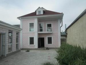 Жилой дом с земельным участком на улице Огонбаева