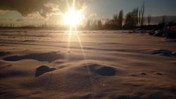 Снежный закат на Иссык-Куле