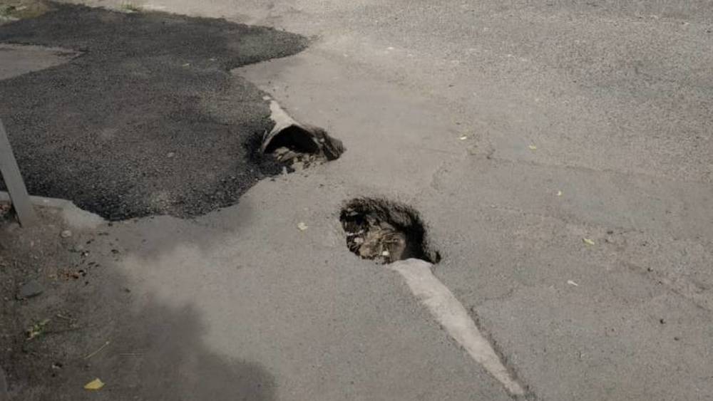 Дорожные ямы от водосточных труб на Шопокова — Жибек Жолу