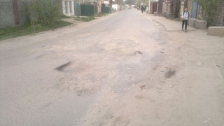 На основной дороге Саадаева в жилмассиве «Ак-Босого» горводоканал проводил работы, оставив после них ямы, - читатель <b><i>(фото)</i></b>