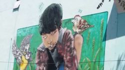 «Как из фильма ужасов». Горожанка жалуется на граффити на стене музыкального училища имени Куренкеева. Фото