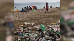 В селе Бактуу-Долонотуу области на общественном пляже разбросано много мусора (видео)