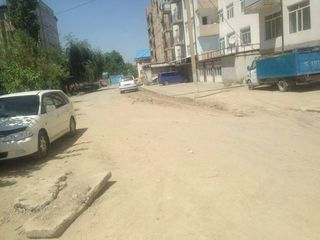 Ошанин просит мэрию убрать грязь на дороге по ул.Джима (фото)