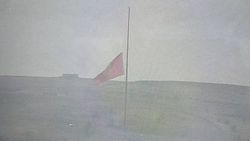 Почему в селе Орто-Сай приспущен флаг Кыргызстана?