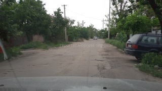 Жители ул. Коммунарова просят мэра о ремонте дороги, которая находится в ужасном состоянии <b><i>(фоторепортаж)</i></b>