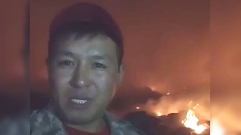 Житель села Искра снял видеообращение на фоне горящей мусорной свалки (видео)