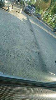 Бишкекчанин: Из-за просевшего грунта на Можайского-Махатмы Ганди асфальтовое покрытие стало выше (фото)