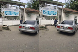 Машина перекрыла въезд в больницу на улице Салиевой в Оше