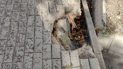 На ул.Токтогула провалился тротуар в двух местах (фото)