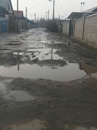 Жители ул.Коммунарова и Среднего Джала жалуются на состояние улиц, где машины еле проезжают <b><i> (фоторепортаж) </i></b>