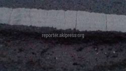 На Жаманбаева - Токтоналиева отремонтированная дорога уже в дырах (фото)